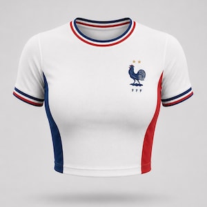 France-inspired white women’s football crop top with rooster crest and blue red trim, front view