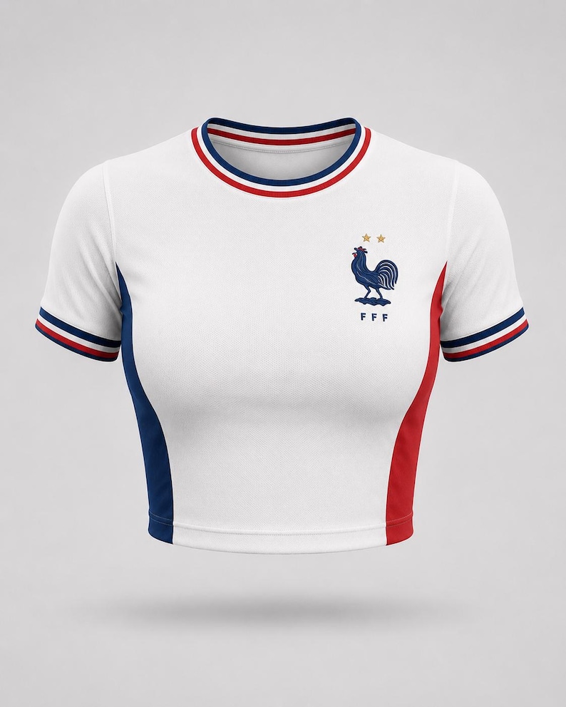 France-inspired white women’s football crop top with rooster crest and blue red trim, front view