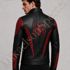 Female model wearing black and red spider inspired leather jacket by MikaelsonSpecter, front view with fitted premium leather biker design