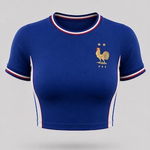 France-inspired blue women’s football crop top with rooster crest and tricolor trim, front view