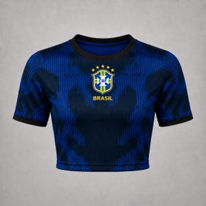 Front product mockup of a navy Brazil-inspired away football crop top with blue pattern, black trim and centered crest