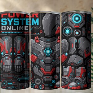 May include: A cylindrical tumbler featuring a black background with red and grey robotic armour components, glowing blue light accents, and the text POWER SYSTEM ONLINE in red and blue letters. The design includes gauntlets, boots, and gear.