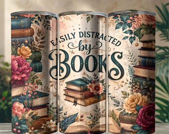 May include: A cylindrical tumbler featuring a cream-colored background with stacks of vintage books, colorful floral arrangements, and the text "EASILY DISTRACTED by BOOKS" in dark green lettering. The design wraps around the entire surface.