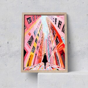 May include: A painting of a person walking down a narrow street lined with tall buildings. The buildings are painted in shades of pink, yellow, and orange, and the street is paved with a colorful pattern. The person is wearing a black coat and is walking towards the viewer.