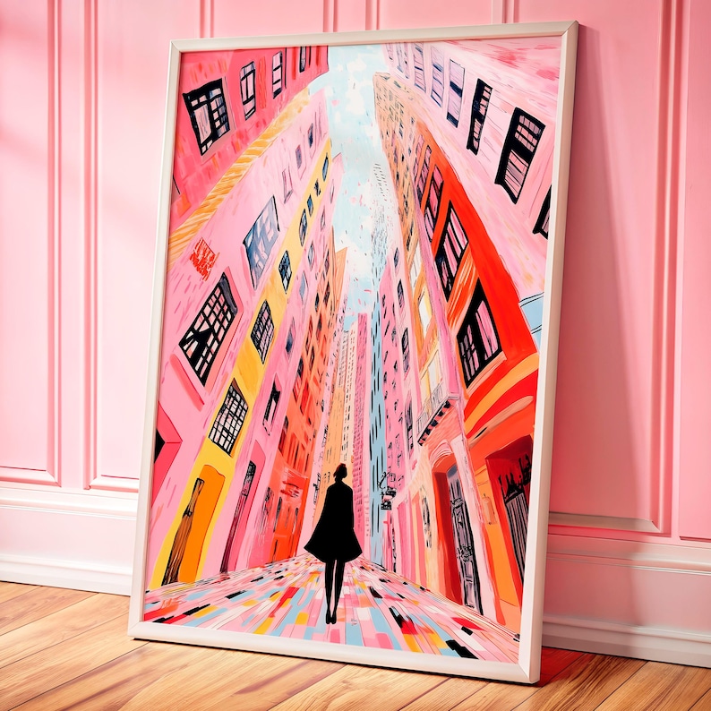 May include: A colorful painting of a city street with tall buildings and a person walking down the middle. The buildings are painted in shades of pink, yellow, and blue. The person is wearing a black coat and is walking towards the viewer.