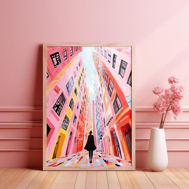 May include: A painting of a person walking down a narrow street lined with colorful buildings. The buildings are painted in shades of pink, yellow, and blue. The person is wearing a black coat and is walking towards the viewer.