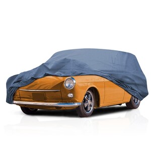 May include: A blue car cover draped over an orange vintage car. The cover is made of a durable material and protects the vehicle from the elements. The car has chrome accents and black tires. The image is set against a white background.
