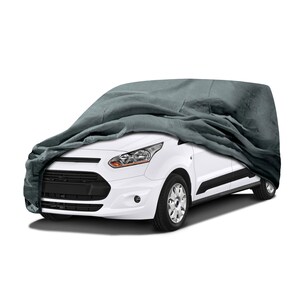 May include: A white van is partially covered by a gray car cover. The cover drapes over the front of the vehicle, obscuring the hood and windshield. The van has black trim and silver wheels.