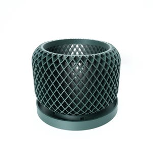 Ravik orchid pot with matching saucer, shown from front angle in dark green color