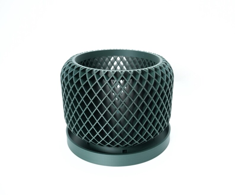 Ravik orchid pot with matching saucer, shown from front angle in dark green color
