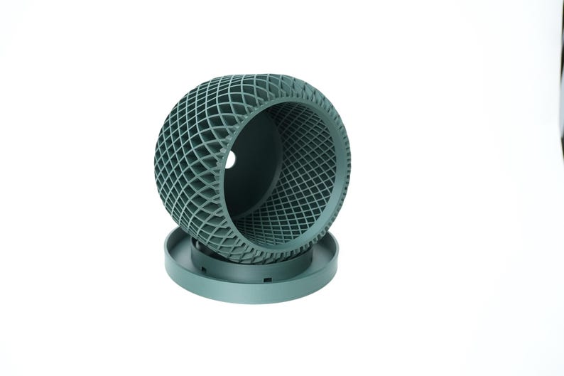 Ravik orchid planter pot side view showing hollow interior, airflow openings, and matching tray