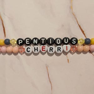 Hazbin Hotel inspired bracelets - Sir Pentious and Cherri Bomb