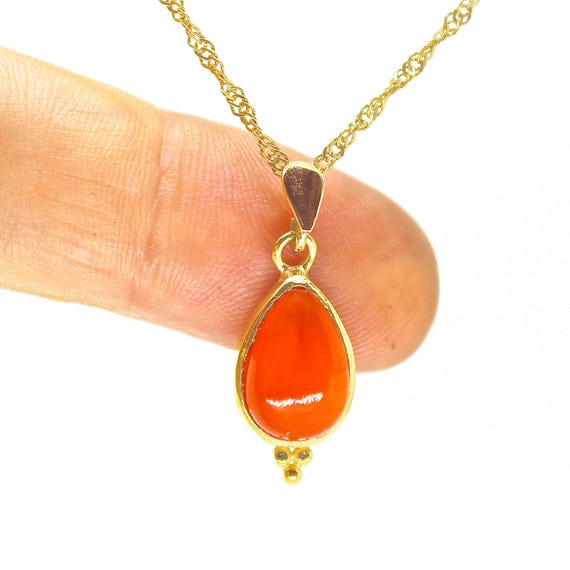Orange stone pendant deals