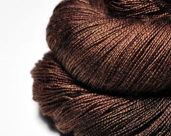 Dark chestnut lying on the street - Seide / Merino Lacegarn superwash - Seide / Merino Garn handgefärbt - DyeForYarn