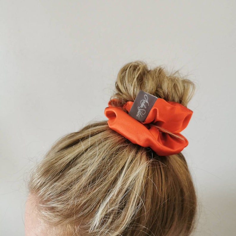 Hair scunchie upcycled from used mans tie save the planet neck tie fun by Amber Sisters