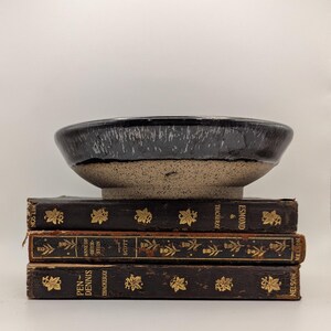 Hand made pottery bowl: blue and black glaze