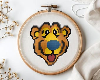 Patrón de bordado de punto de cruz de un oso azul vintage de los 90 (archivo PDF)