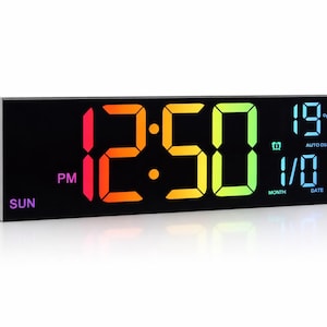 May include: A black digital alarm clock displaying the time as 12:50 PM in a gradient of colors. The date is 1/01, and the temperature is 19°C. The word "SUN" is displayed on the left side of the clock.