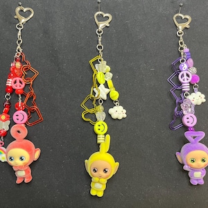 Llaveros con dijes para bolsos de los Teletubbies, ideales para el espejo retrovisor.