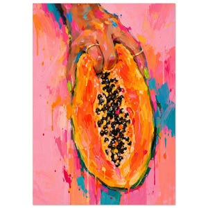 May include: An expressive oil painting featuring a hand holding a halved papaya with visible black seeds. The artwork uses vibrant orange, yellow, and pink brushstrokes with splashes of blue, creating a textured and colorful composition.