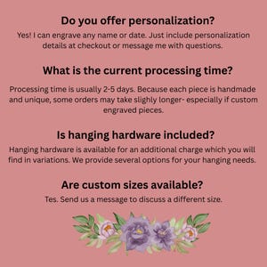 May include: A pink informational graphic with black text answering frequently asked questions about personalization, processing times, hanging hardware, and custom sizes, featuring a decorative illustration of purple flowers and green leaves at the bottom.