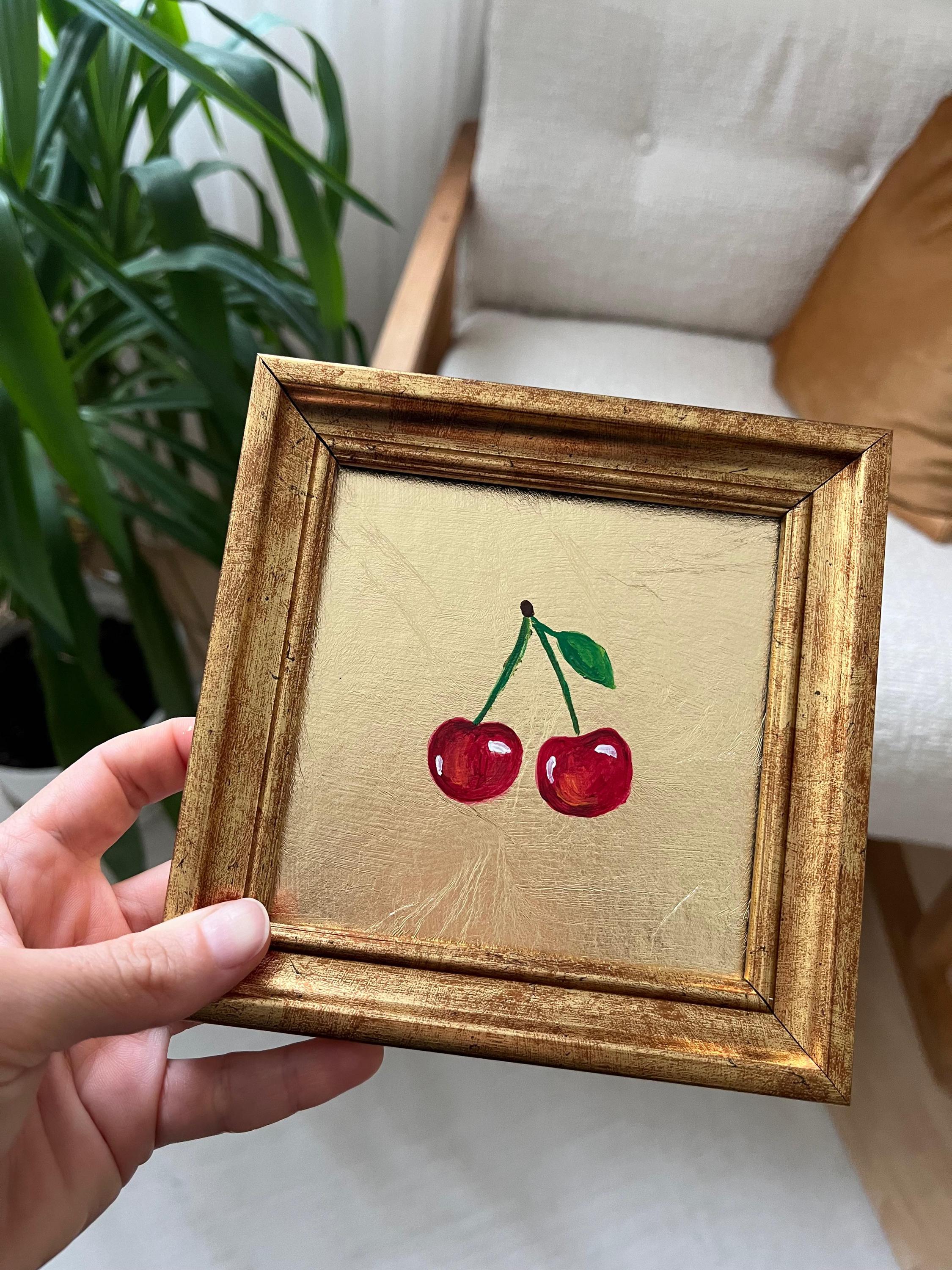 金箔に描かれたさくらんぼの絵画｜額入りキッチンウォールアート