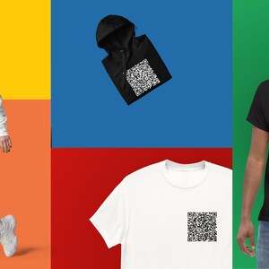 May include: A white hoodie, a black hoodie, a white t-shirt, and a black t-shirt, all featuring a black and white QR code design.