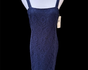 Stunning navy lace dress with a fitted silhouette Perfect for special occasions
