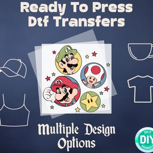 May include: Ready to press DTF transfers featuring a design with Mario, Luigi, and Toad. The design is on a clear sheet with a white background. The text "Do It Yourself" is on a green circle with a white background.