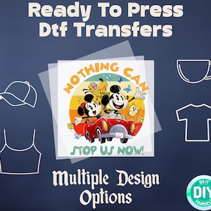 May include: A red, white, and blue DTF transfer with a retro design featuring Mickey Mouse, Minnie Mouse, and Pluto in a car. The text "NOTHING CAN STOP US NOW!" is printed on the transfer.