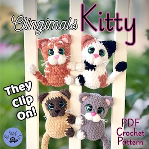 May include: Four crocheted cat toys labeled Clingimals Kitty and They Clip On! The cats are orange tabby, calico, Siamese, and gray, all featuring large green or blue eyes, pink noses, and white whiskers. This is a PDF Crochet Pattern.