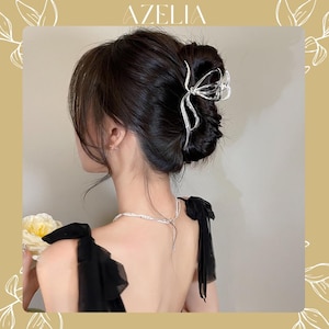 バタフライメタルヘアクロウクリップ：女性のためのエレガントなシルバーヘアアクセサリー、強力なグリップ、ミニマリストの美学、スタイリッシュなアップドホルダー、彼女へのギフト。