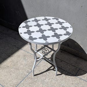 May include: A set of three ceramic mugs with a speckled, matte finish. The mugs are in shades of cream, light brown, and dark brown. Each mug has a simple, minimalist design, perfect for coffee or tea.