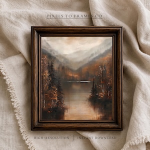 May include: A dark brown wooden frame containing a landscape painting of a lake surrounded by autumn trees and distant mountains. The text PIXELS TO FRAMES CO is at the top, and HIGH-RESOLUTION INSTANT DOWNLOAD is at the bottom of the image.
