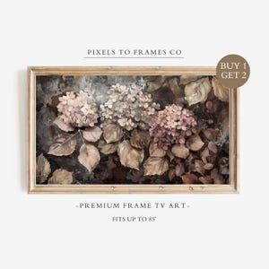 May include: A rectangular digital artwork for a television screen featuring a floral painting of hydrangea clusters in muted pink, beige, and brown tones. The text PIXELS TO FRAMES CO, BUY 1 GET 2, PREMIUM FRAME TV ART, and FITS UP TO 85" are visible.