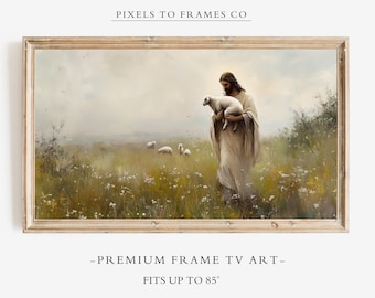 May include: A framed digital artwork titled PIXELS TO FRAMES CO featuring a figure in a robe carrying a lamb in a field with other sheep. The text below reads PREMIUM FRAME TV ART FITS UP TO 85 INCHES. The scene is rendered in soft, muted tones.