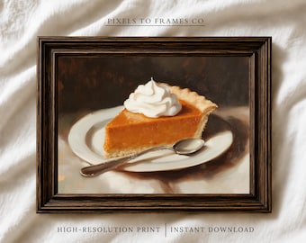 May include: A framed art print featuring a painting of a slice of pumpkin pie topped with whipped cream on a white plate with a silver spoon. The text PIXELS TO FRAMES CO, HIGH-RESOLUTION PRINT, and INSTANT DOWNLOAD are visible on the image.