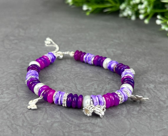 Small purple bracelet with charms
