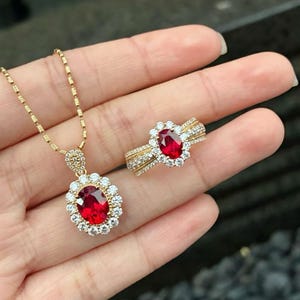 May include: A rustic wooden sign with the text "Welcome to our home" in white lettering. The sign features a distressed finish and a simple, inviting design, perfect for a front porch or entryway.