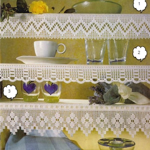 May include: Three white crocheted shelf edgings with different patterns. The top edging has a diamond pattern, the middle edging has a scalloped pattern, and the bottom edging has a floral pattern.