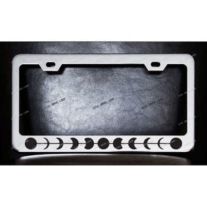 Cadre de plaque d'immatriculation chromé phases de lune