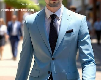 May include: A man wearing a light blue suit jacket and matching pants. He is wearing a white shirt with a dark blue tie and a black pocket square. He is also wearing sunglasses.