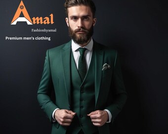 May include: A man wearing a dark green three-piece suit with a white shirt and a dark green patterned tie. The suit has a pocket square in the left breast pocket. The man has a beard and is looking at the camera. The text "Amal Fashionbyamal Premium men's clothing" is visible at the top of the image.