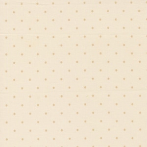 Può includere: Un tessuto color crema chiaro caratterizzato da un motivo ripetitivo di piccoli pois color marrone chiaro uniformemente distanziati. Il materiale presenta una trama visibile e un design coerente e uniforme su tutta la superficie, dall'aspetto semplice.