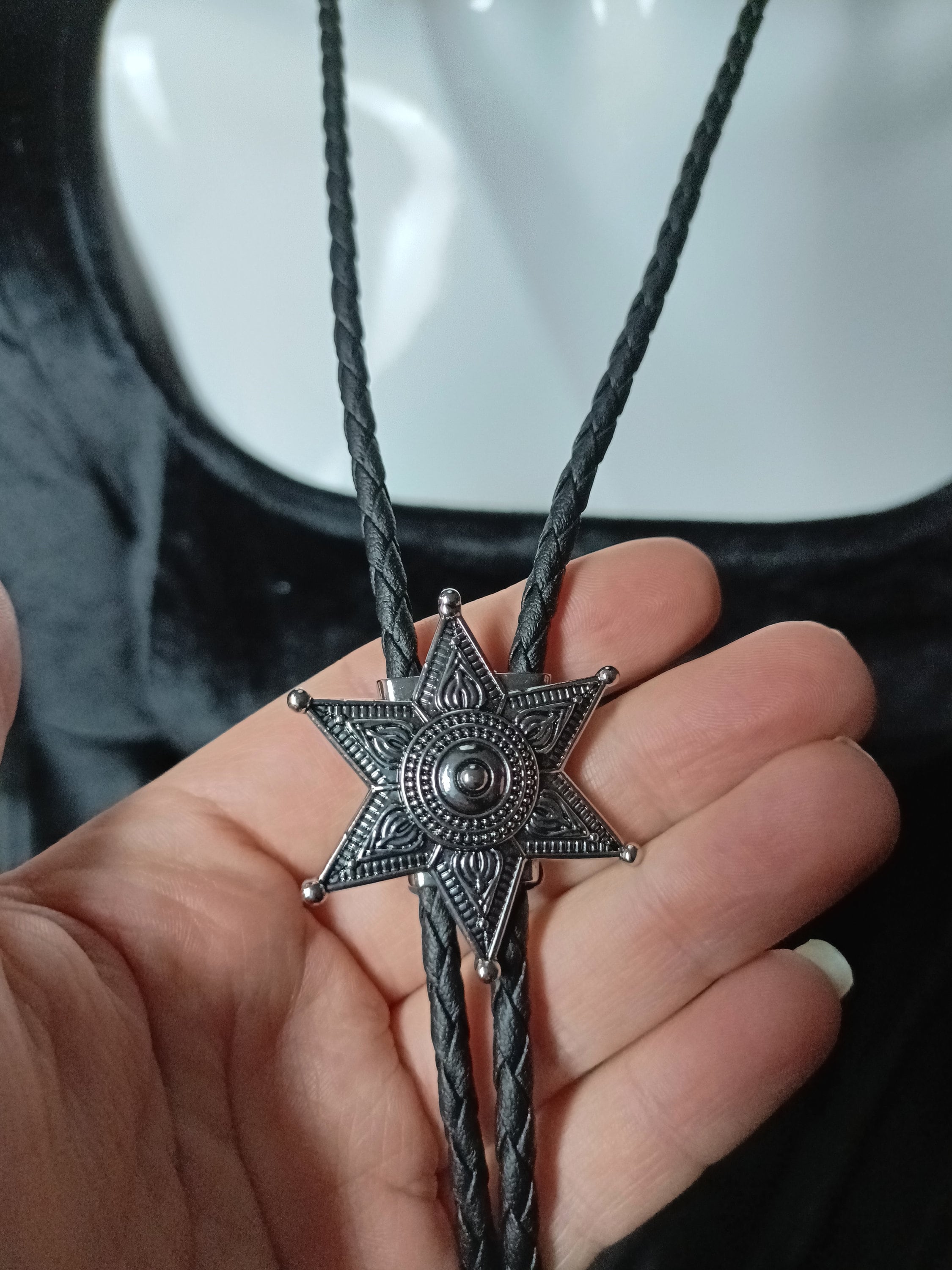 Silver shop bolo tie