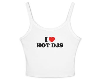 May include: White tank top with thin straps. The text "I ♥ HOT DJS" is printed in black with a red heart symbol. The top is made of a ribbed material.