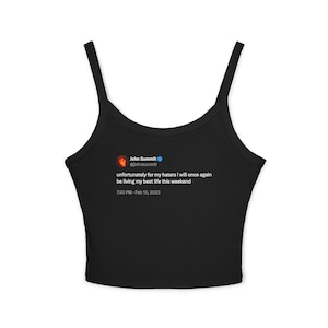 May include: Black vest top with thin straps. The top displays a Twitter post by John Summit: "unfortunately for my haters i will once again be living my best life this weekend" and the date Feb 10, 2023.