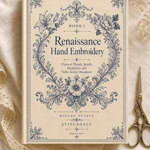 以下が含まれることがあります： Ridvan Yusein Stitchesly著のハードカバー本「Renaissance Hand Embroidery Book 1」。クリーム色の表紙には、青い花やスクロール模様の複雑なイラストが描かれており、古典的な花柄、スクロール、メダリオン、織物の装飾に関するテキストが記載されています。