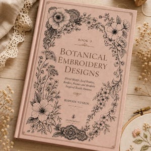 May include: A hardcover book titled Botanical Embroidery Designs Book 3 by Ridvan Yusein, featuring a dusty pink cover with black ink illustrations of floral motifs, leaf studies, borders, frames, and broderie inspired textile patterns.