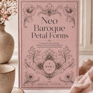 May include: A hardcover book titled Neo Baroque Petal Forms Book 2 by Ridvan Yusein. The cover is dusty pink with intricate black floral and ornamental line art illustrations, featuring a central oval frame and elegant serif typography.